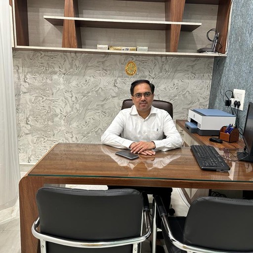 Dr. Kiran S