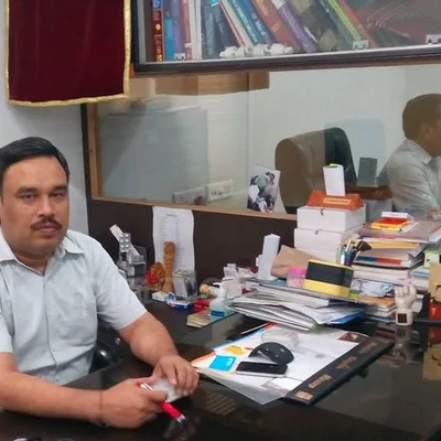 Dr. Raghuveer Sharma