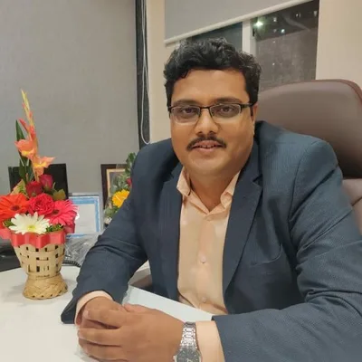 Dr. Bhushan Mhetre