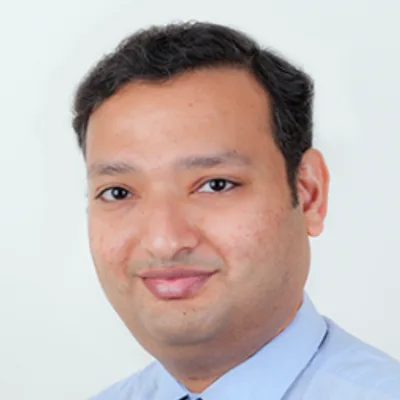 Dr. Mangesh B Danej
