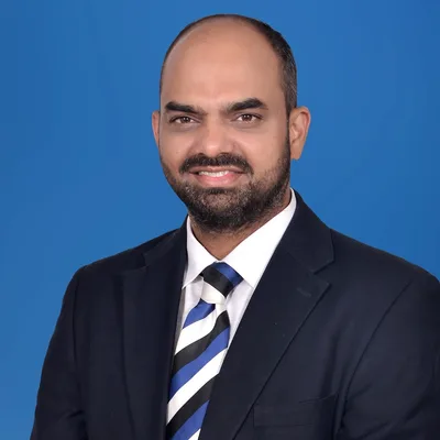 Dr. Manish Dastane