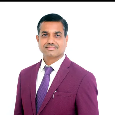 Dr. Mohan Pawar