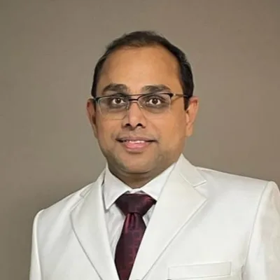 Dr. Siraj Basade