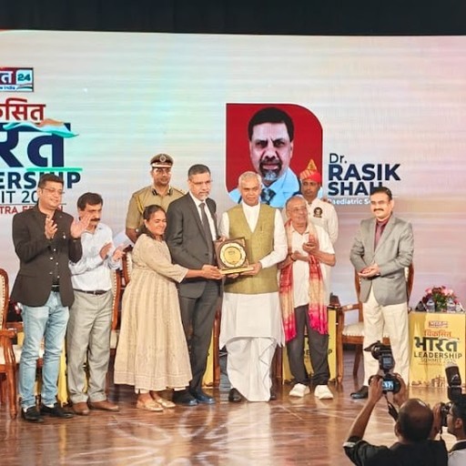 Dr. Rasik Shah