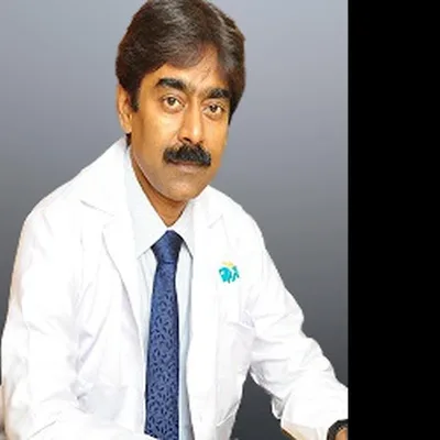 Dr. TAMAL LAHA