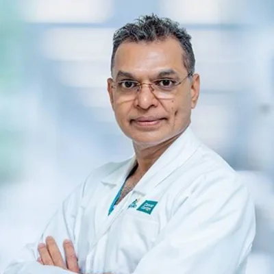 Dr. Mani C S