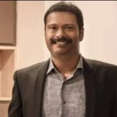 Dr. M R Pari