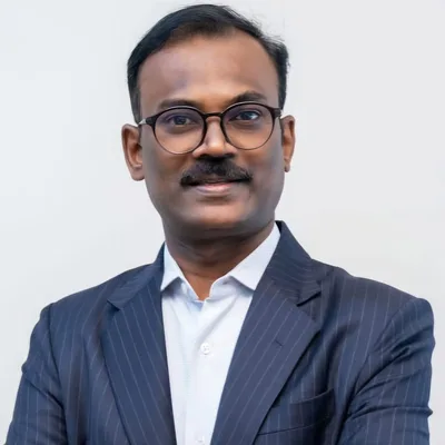 Dr. Arumugam C