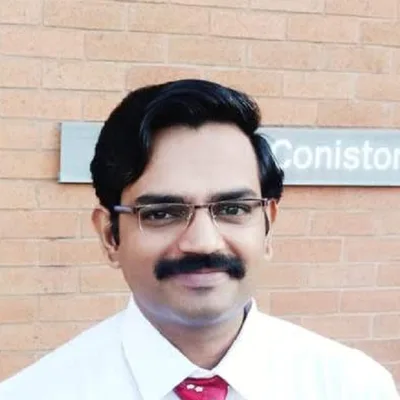 Dr. Balaji B