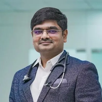 Dr. Binoy John