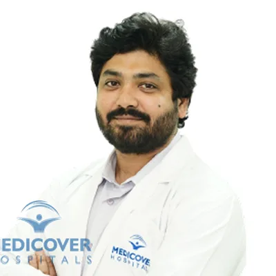 Dr. Raveesh Ajmeera