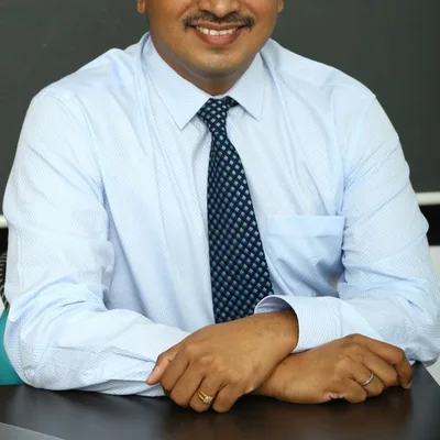 Dr. Roshan Rayen