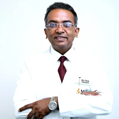 Dr. Anil Tomar