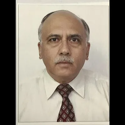 Dr. Krishan Kapur