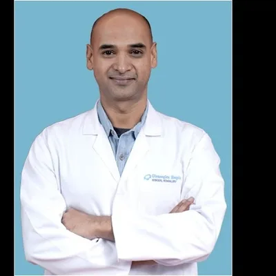 Dr. Govind E