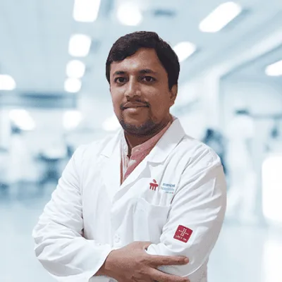 Dr. Puneeth K T