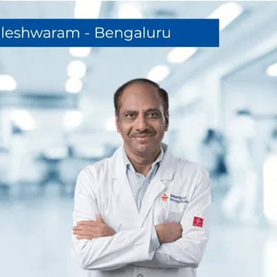 Dr. Dinesh V Kamath