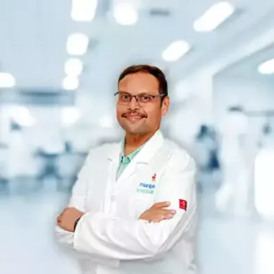 Dr. Mahesh M
