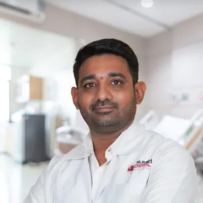 Dr. Abhinay I