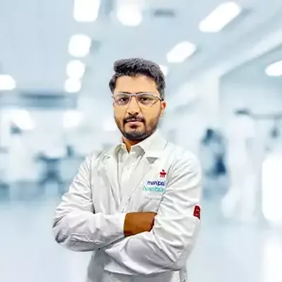 Dr. Umesh K J