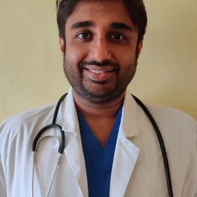 Dr. Arjun M B