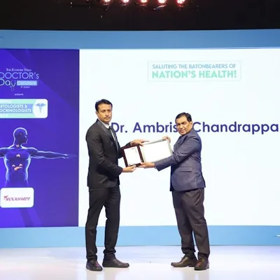 Dr. Ambrish C