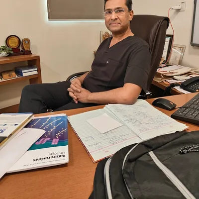 Dr. Girish Nelivigi
