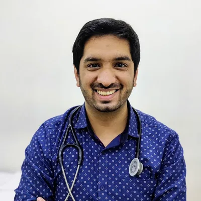 Dr. Suhas B