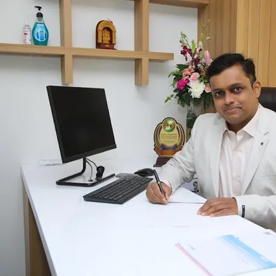 Dr. Kiran J