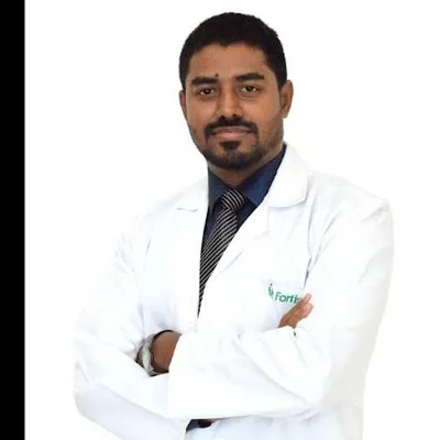 Dr. HARISH C