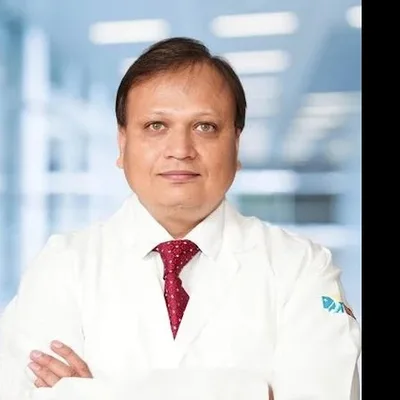 Dr. Santosh B