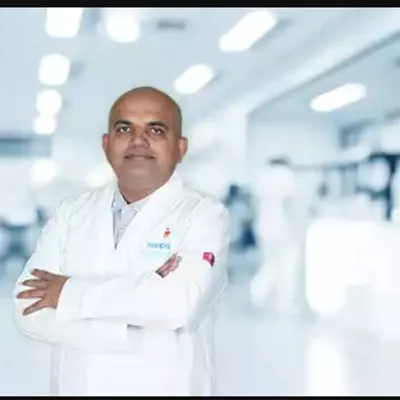Dr. Dayananda L