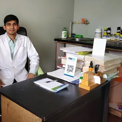 Dr. Pannag Kamat