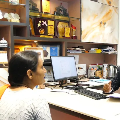 Dr. Mukesh Pednekar