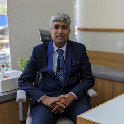 Dr. Dinesh Kasture