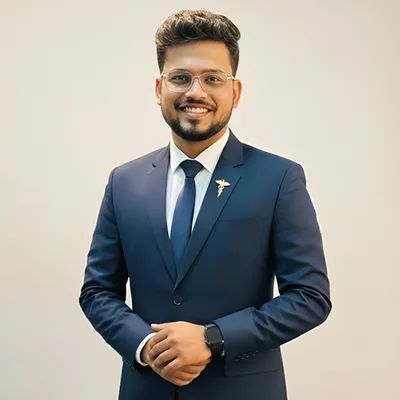 Dr. Aniket Shingane
