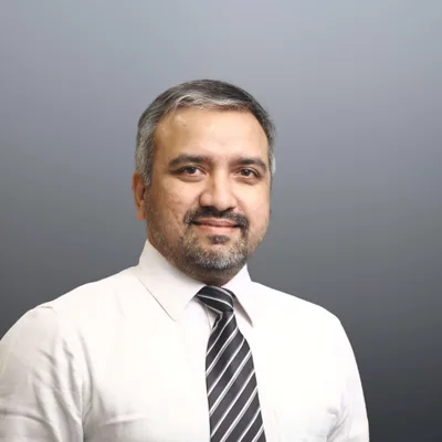 Dr. Joy Varghese