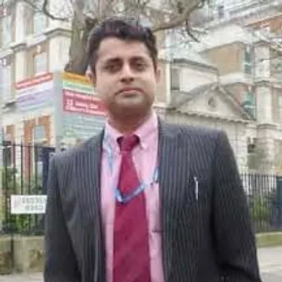 Dr. P S Mukherjee.