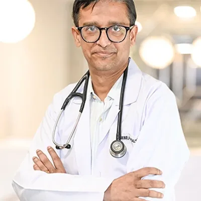 Dr. Raja Dhar.