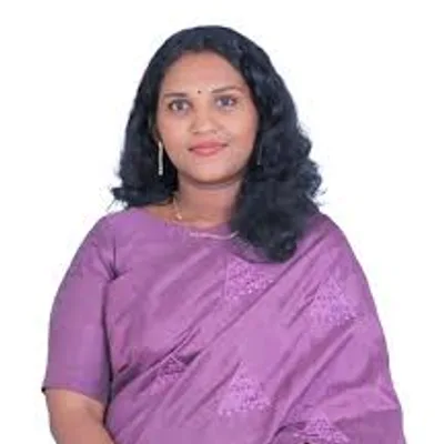 Dr. ANJU A T