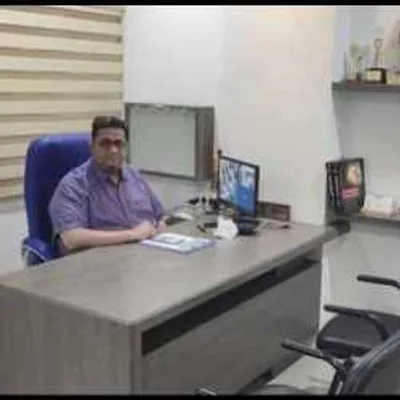 Dr. Dhiraj Sathe