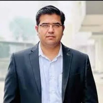 Dr. Ujjwal Sharma