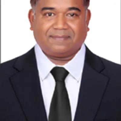 Dr. B. Dinesha