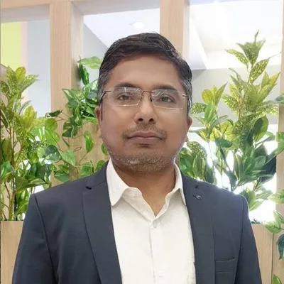 Dr. Pritam Titar
