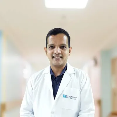 Dr. Sarang Kanekar