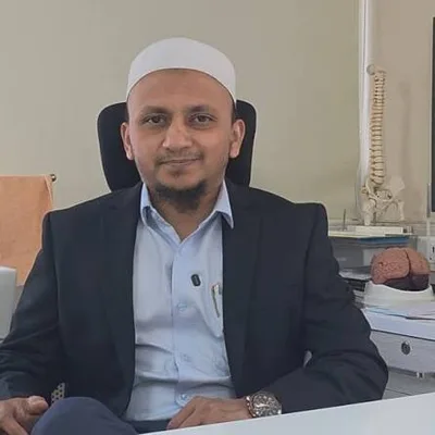 Dr. Muzammil Ambekar