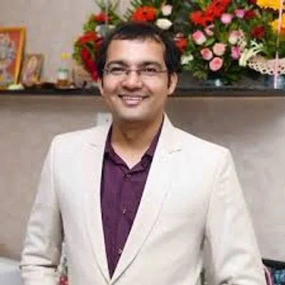 Dr. Niket Thombre