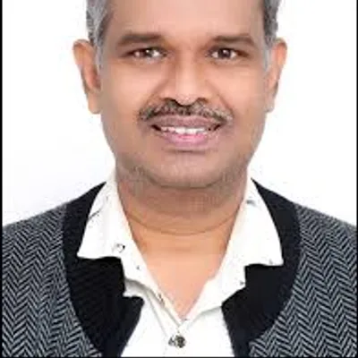 Dr. Pitambar Masram