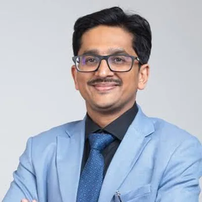 Dr. Tarun Mittal
