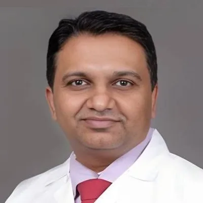 Dr. Amar Amale